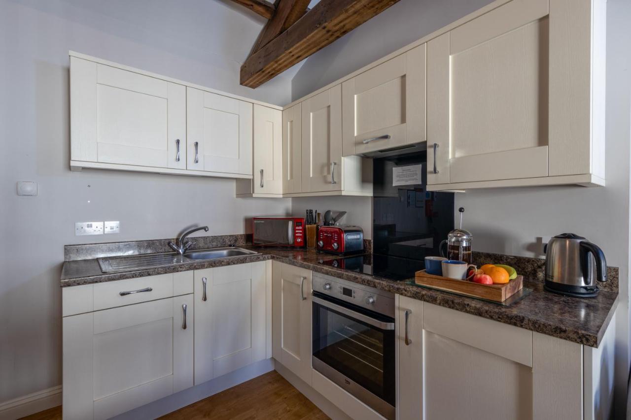 Brampton Holiday Homes - The Mews Apartment Bagian luar foto